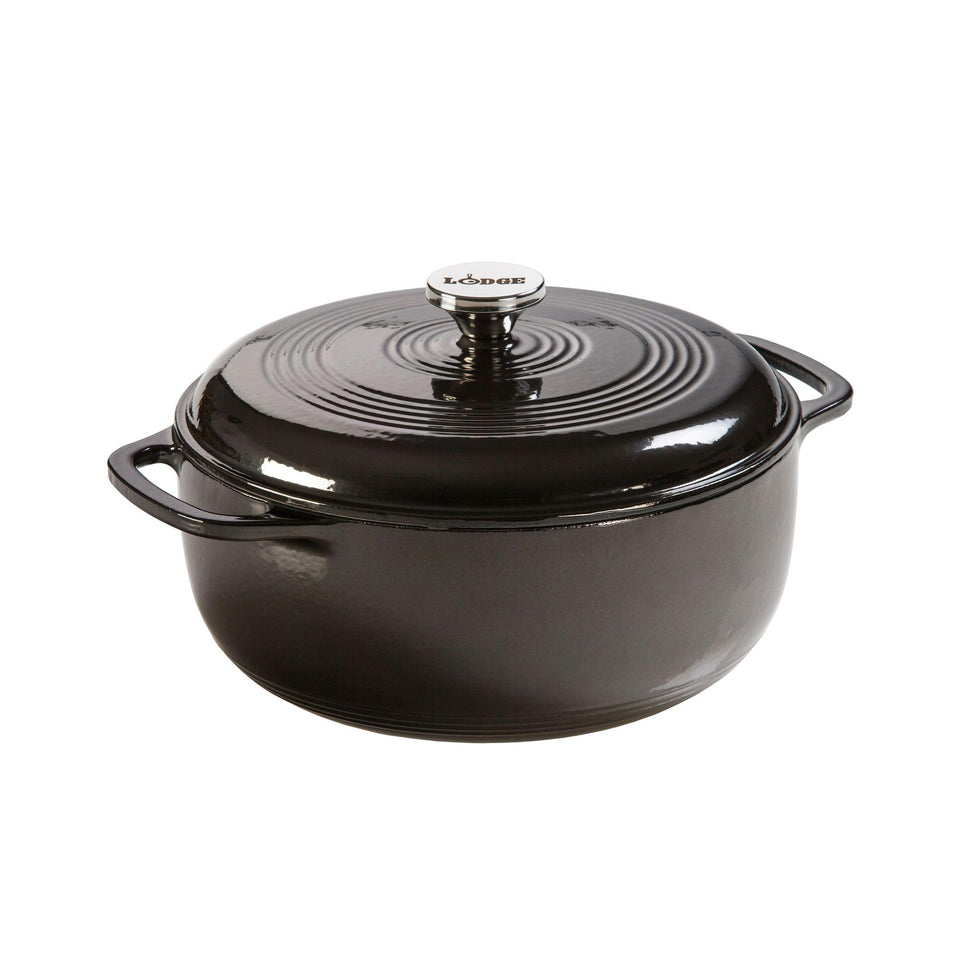 Lodge essential enamel Dutch oven with lid on, ideal for braising.
