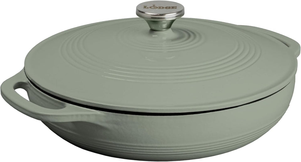 Lodge Essential Enamel Braiser Desert Sage with lid on for moisture retention.