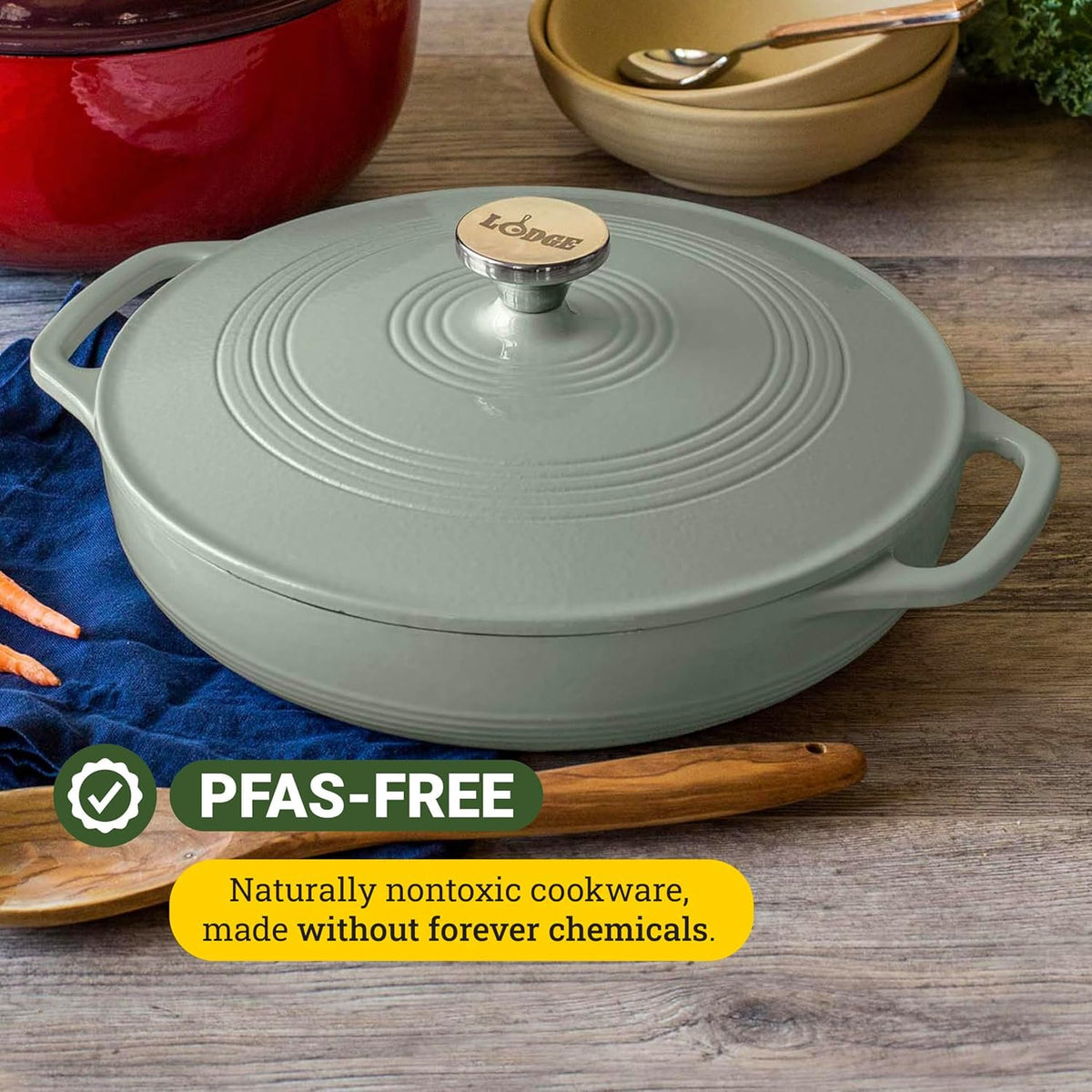 Lodge Essential Enamel Braiser shown on induction cooktop for versatile use.