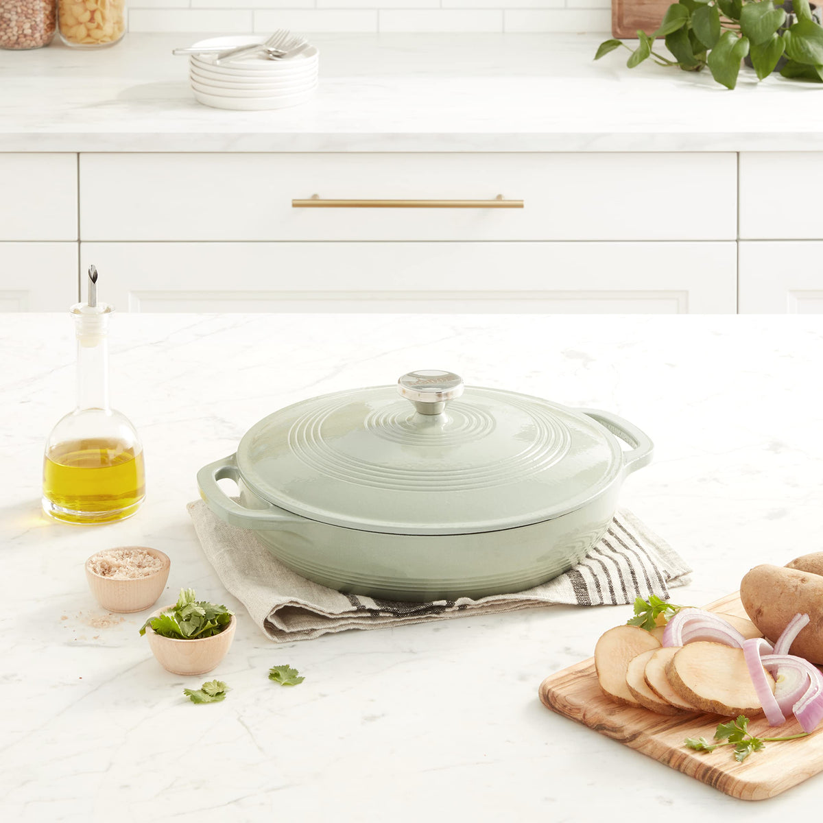 Lodge Essential Enamel Braiser shown transitioning from stovetop to table for easy cooking.