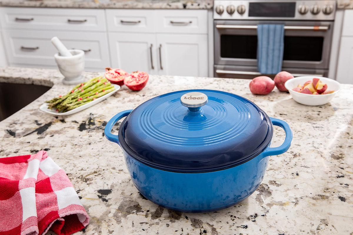 Lodge Essential enamel cast iron dutch oven side view highlights dual assist handles for secure grip