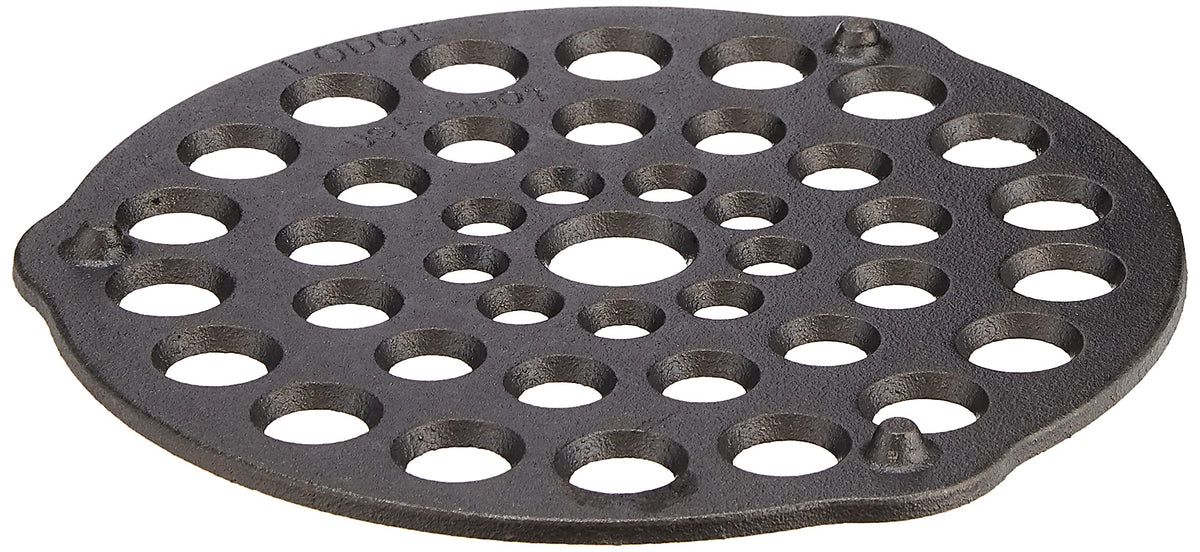 Lodge L8DOT3 meat rack elevates foods in a Dutch oven for even browning.