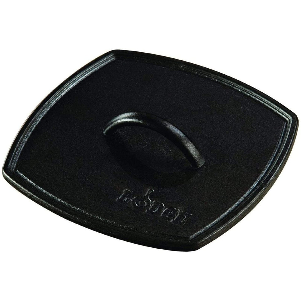 Lodge LPP3 square ribbed panini press showing crisp grill marks for sandwiches.