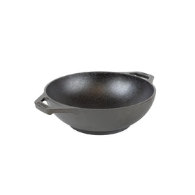 Lodge mini-wok with dual-loop handles for easy grip.