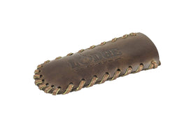 Lodge Nokona leather hot handle holder on teardrop handle, secure heat protection.