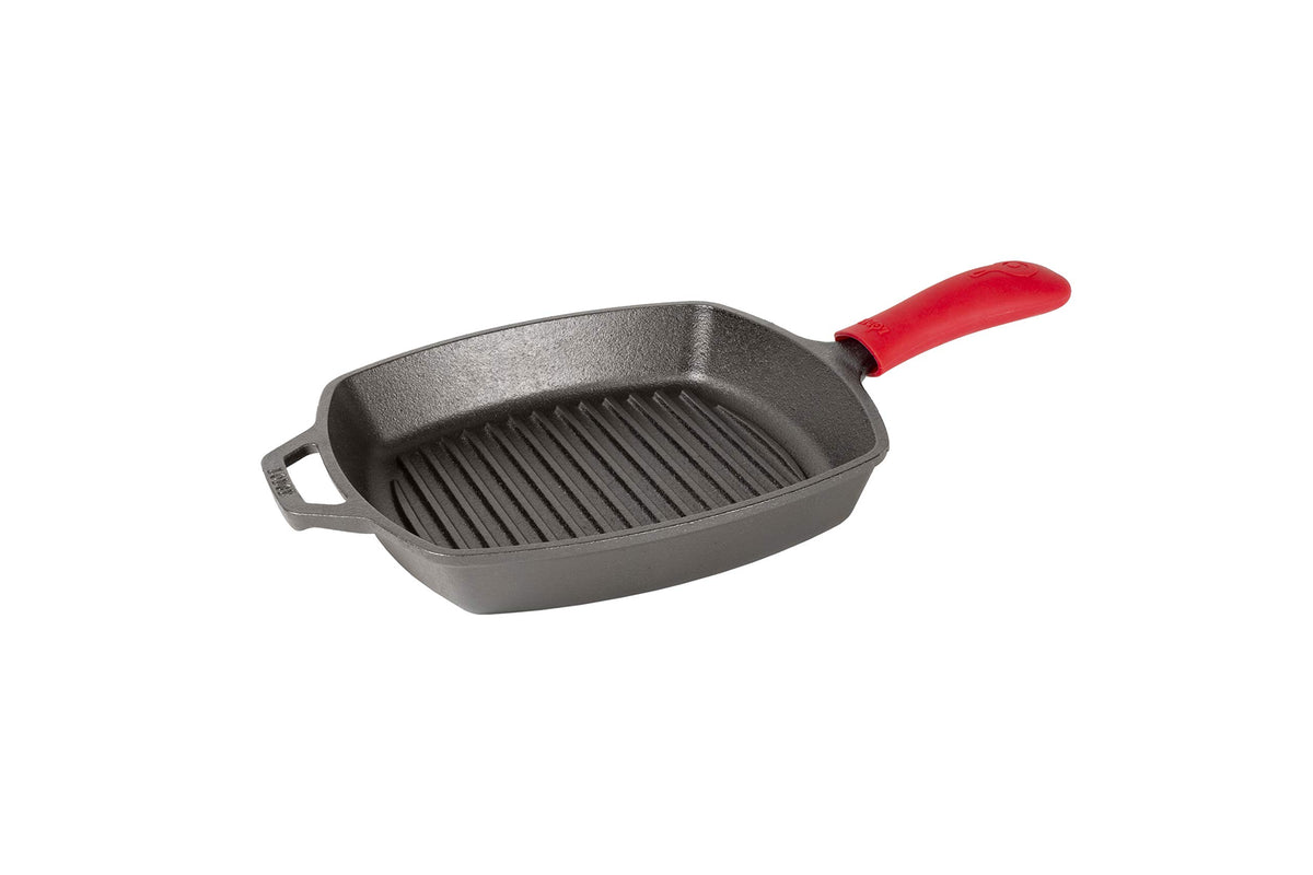 Lodge red silicone hot handle holder provides safe grip during cooking.