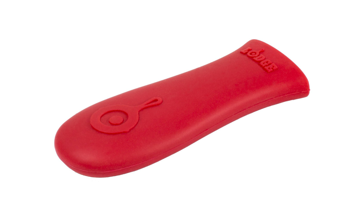 Lodge Seasoned Cast Iron Care Kit silicone-handle-holder protects hands up to 500°F.