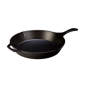 Lodge Seasoned Cast Iron Skillet teardrop handle close-up for easy lifting.