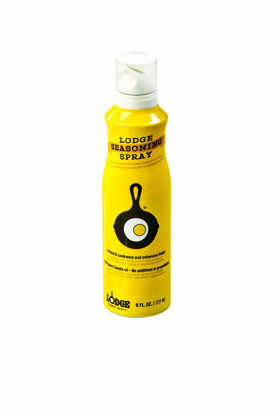 Lodge Seasoning Spray with canola oil applying a light layer for even cast iron seasoning