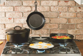 Lodge cast iron skillet shown on stove and campfire for versatile cooking