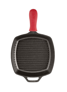 Lodge square grill pan searing steaks for rich caramelization and flavor.