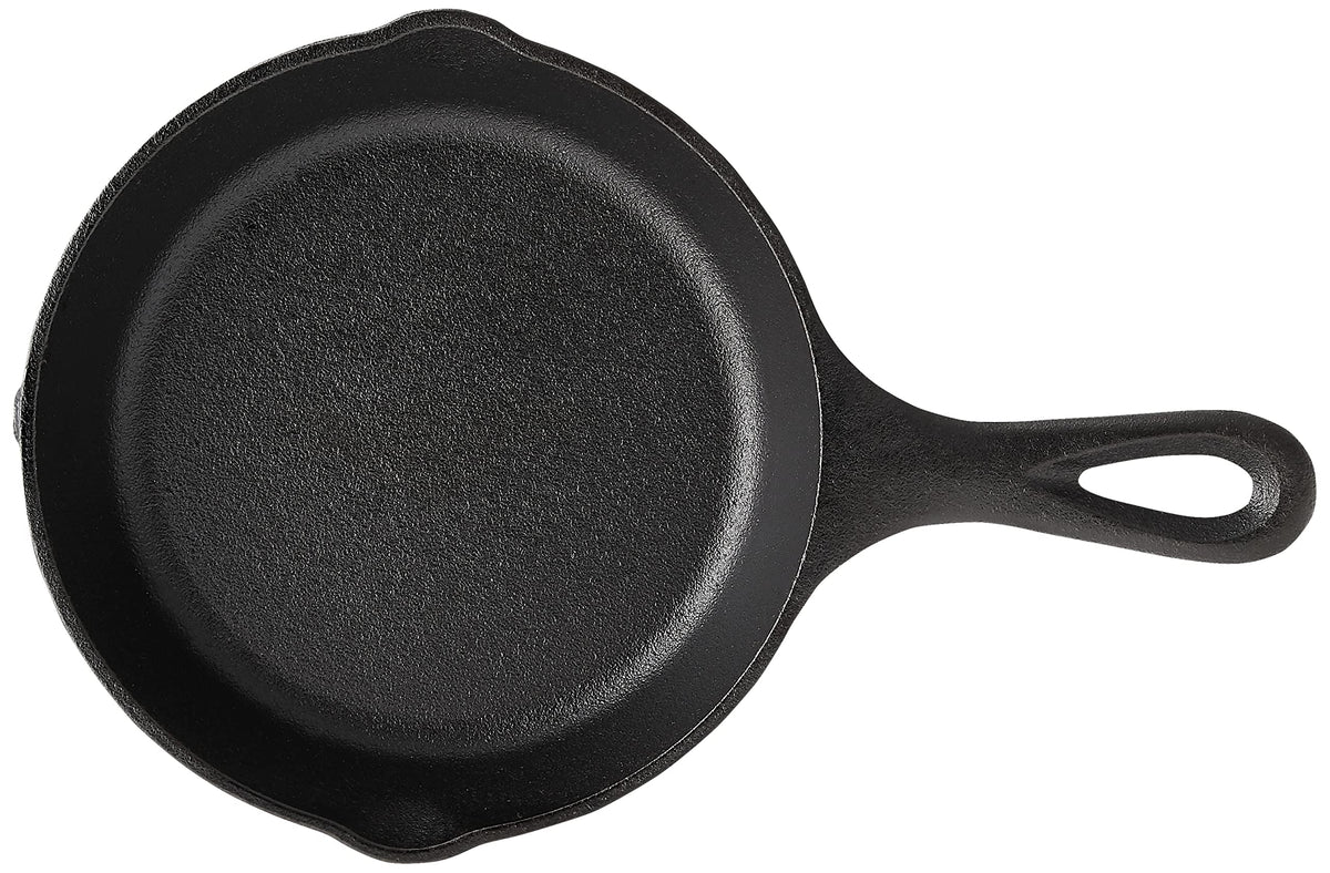 Lodge Wildlife Series cast iron skillet in use for even browning and sautéing