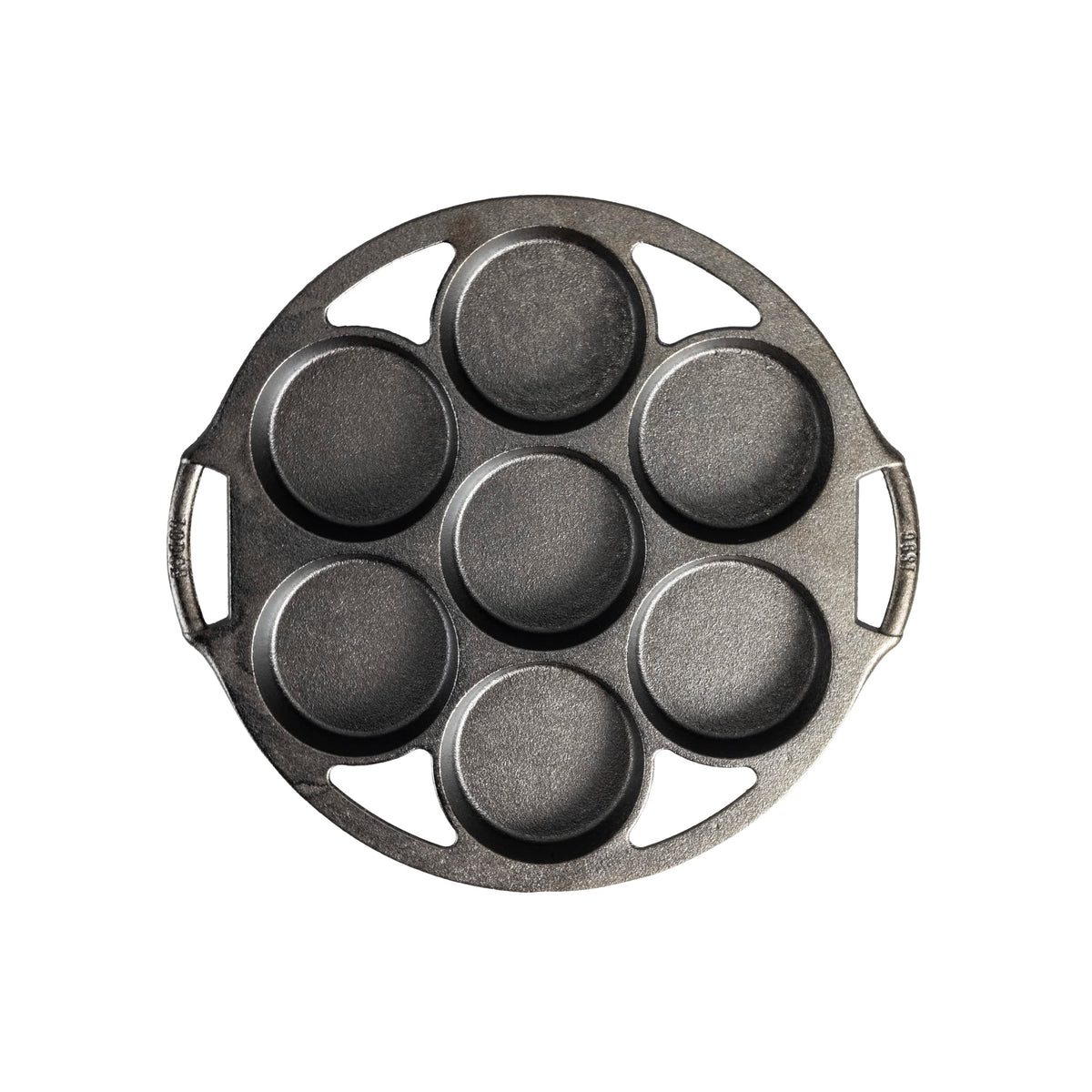 Lodge cast iron mini cake pan with side handle, sturdy for even baking