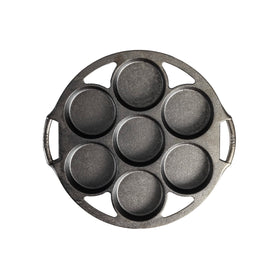 Lodge cast iron mini cake pan with side handle, sturdy for even baking