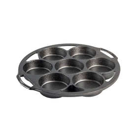 Lodge cast iron mini cake pan, top view, ideal for portion-sized desserts