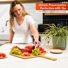 Loftern wooden pizza peel serving board ready for display and slicing