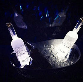 LOGUIDE stick-on coaster discs reflect light through liquid for striking effects