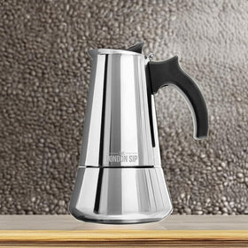 The London Sip moka pot in use brewing espresso for guests.