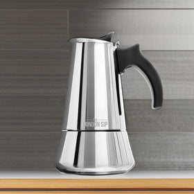 The London Sip moka pot on a gas stove shows cafe-style espresso in minutes