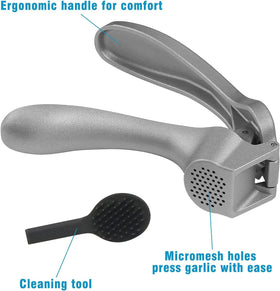 Longmann Pampered Chef garlic press pressing unpeeled garlic quickly and easily.