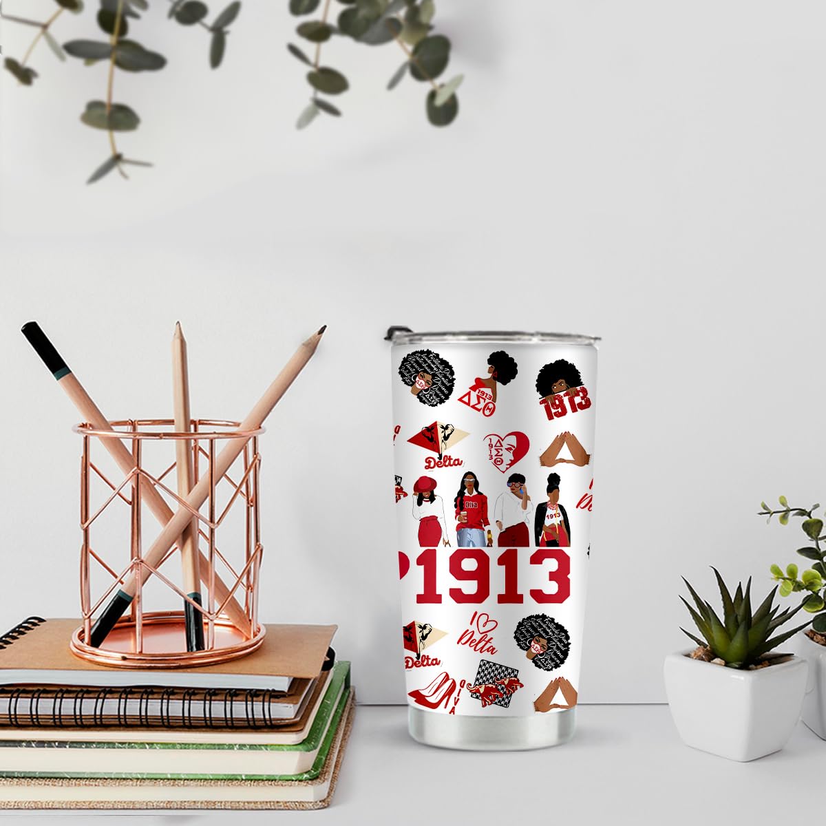 LONGXIN DST Cup 20oz tumbler on a beach scene, portable for outdoor events.
