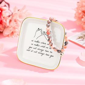 Looca Bestie rose candle, creates calming ambience for relaxation