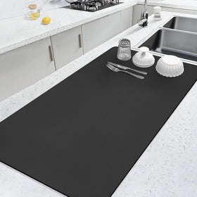 LOPNUR dish drying mat on kitchen counter with diatomite for fast water absorption.