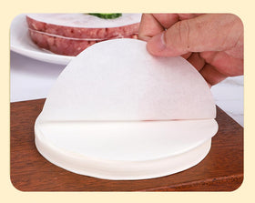 LOVNBHELP white parchment with nonstick coating for secure patty handling.