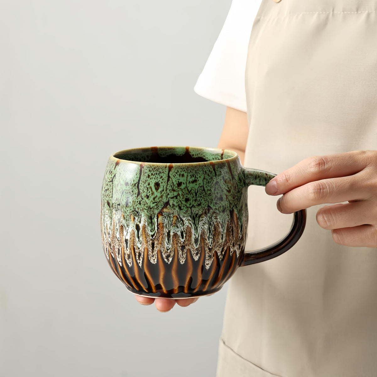 lpylxingyan 20oz mug with raku glaze showcases a unique pattern and keeps morning coffee inviting