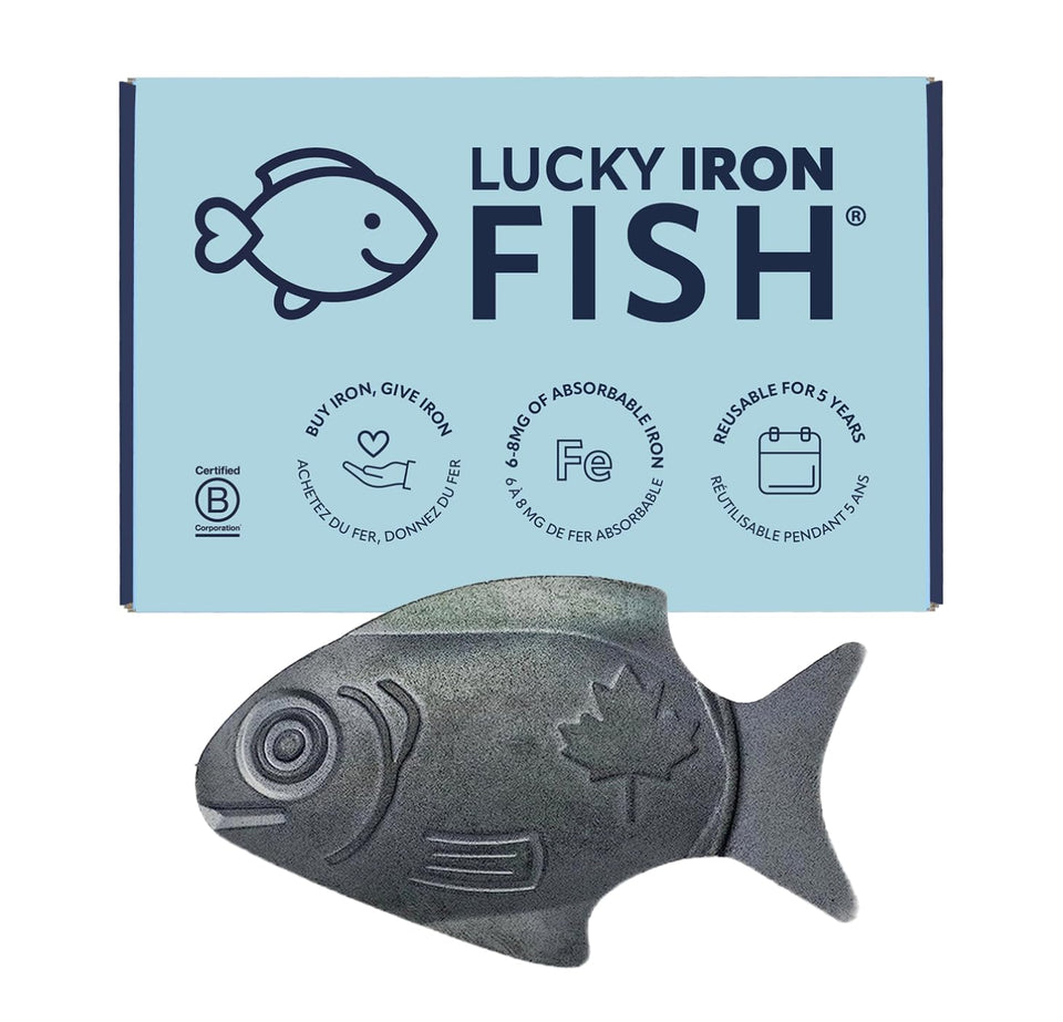 Lucky Iron Fish in pot fortifying a meal with gentle iron release.