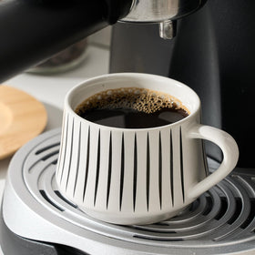 Stacked LUKA cups demonstrate compact storage.
