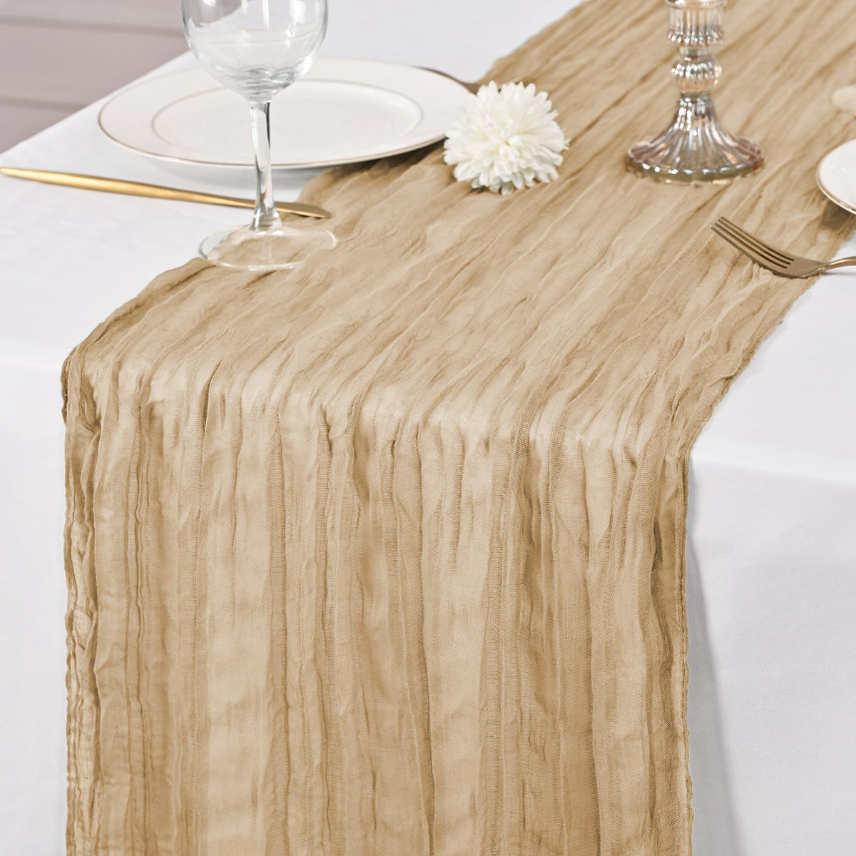 Lumaycens backdrop draping using beige cheesecloth table runners.