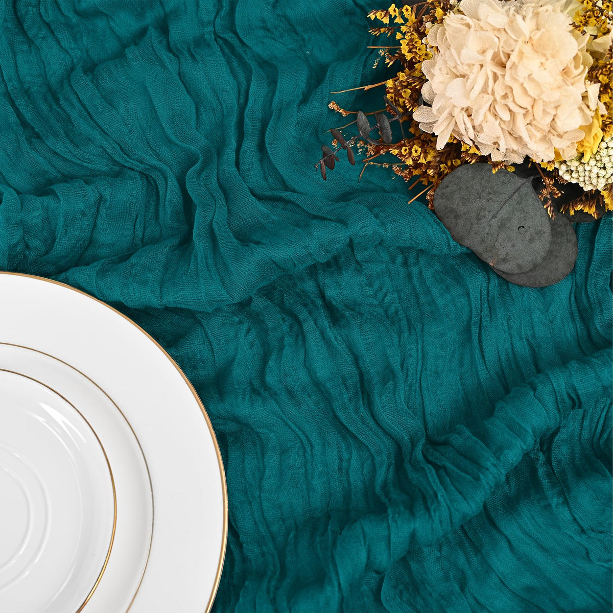 Lumaycens teal table runner elegantly draped for a chic setup.