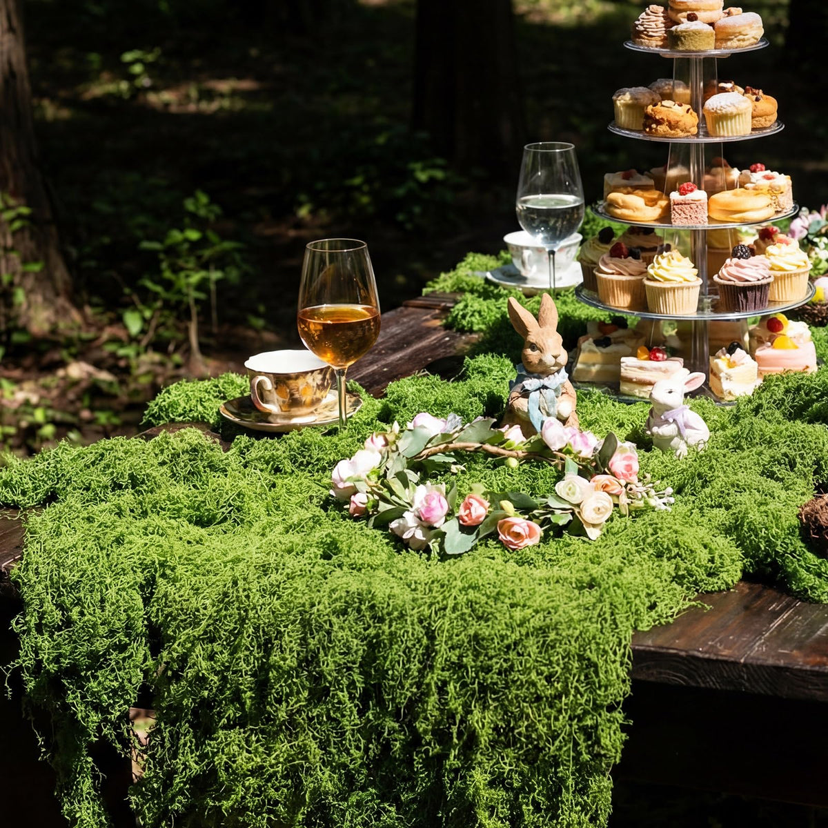 Lumina Garden birthday table decor moss runner adds fairy-tale atmosphere.