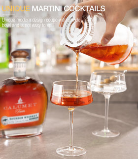 Luna & Mantha hand-blown crystal coupe glasses enhance refinement and comfortable grip.