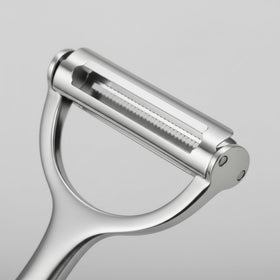 LunaThreads cucumber peeler skinning with swift, gentle removal.