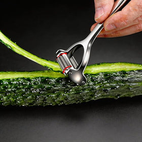 LunaThreads potato peeler in use for smooth, waste-free peeling.