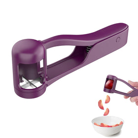 Luvan Grape Cutter in action with one-handed thumb-press slicing.