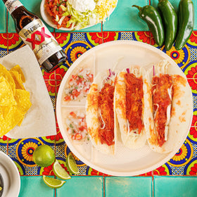 LUVCOSY eco-friendly disposable taco plate for convenient bar or party use.