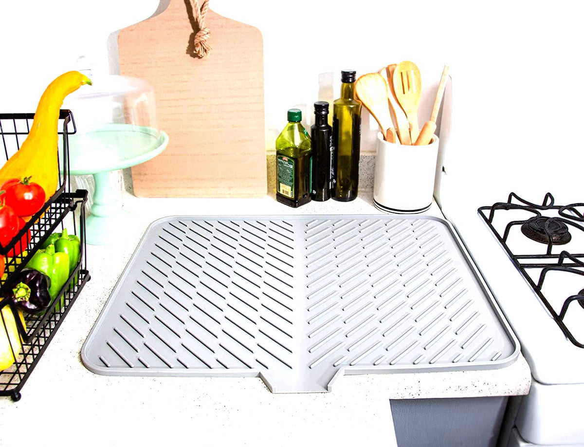 Luxet mat facilitates air drying for dishes, glasses, and utensils.