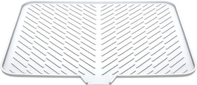 Luxet silicone dish drying mat with built-in drain lip for quick water removal after washing.