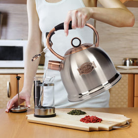 LUXGRACE kettle on stove provides quick hot water for tea or pasta.