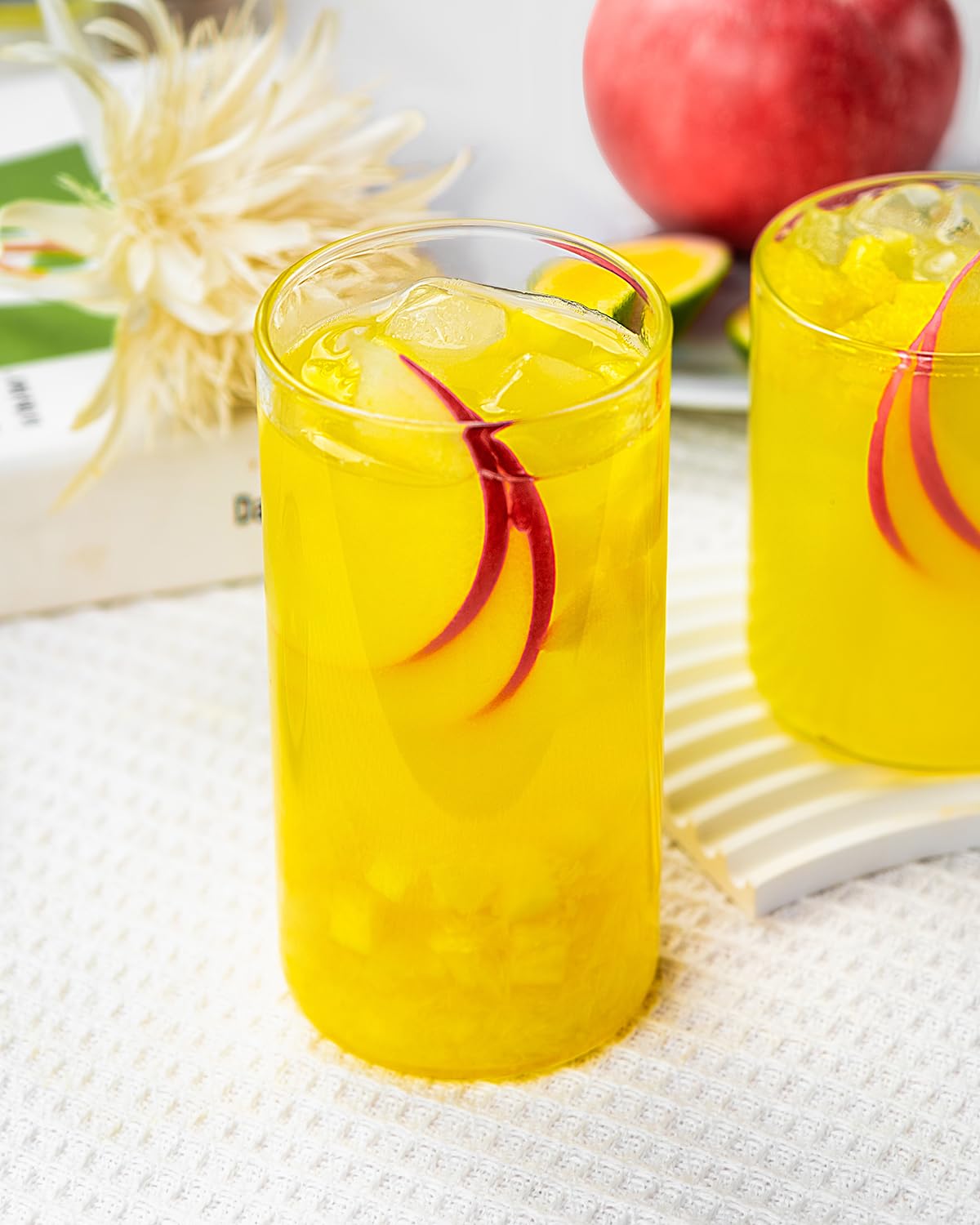 LUXU clear highball glasses pair with meals for modern table settings.