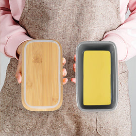 Lxmons bamboo lid doubles as a cutting board for serving.