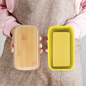 Lxmons butter dish stored on counter for versatile butter prep.