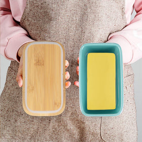Lxmons butter dish on the countertop adds farmhouse style and practicality.