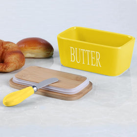 Farmhouse-style Lxmons kitchen decor butter dish on counter.