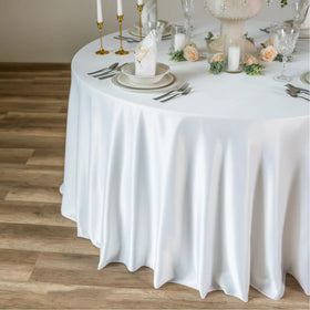 Lxztayuk 120-inch round tablecloth on a dining table setup.