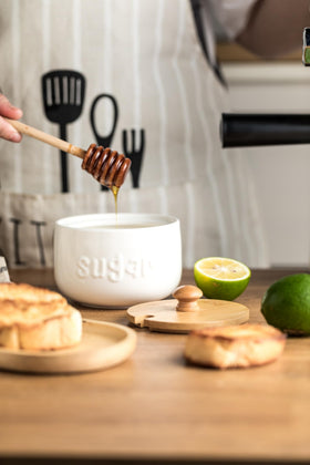 LYEOBOH sugar container organizes dry ingredients in kitchen cabinets.