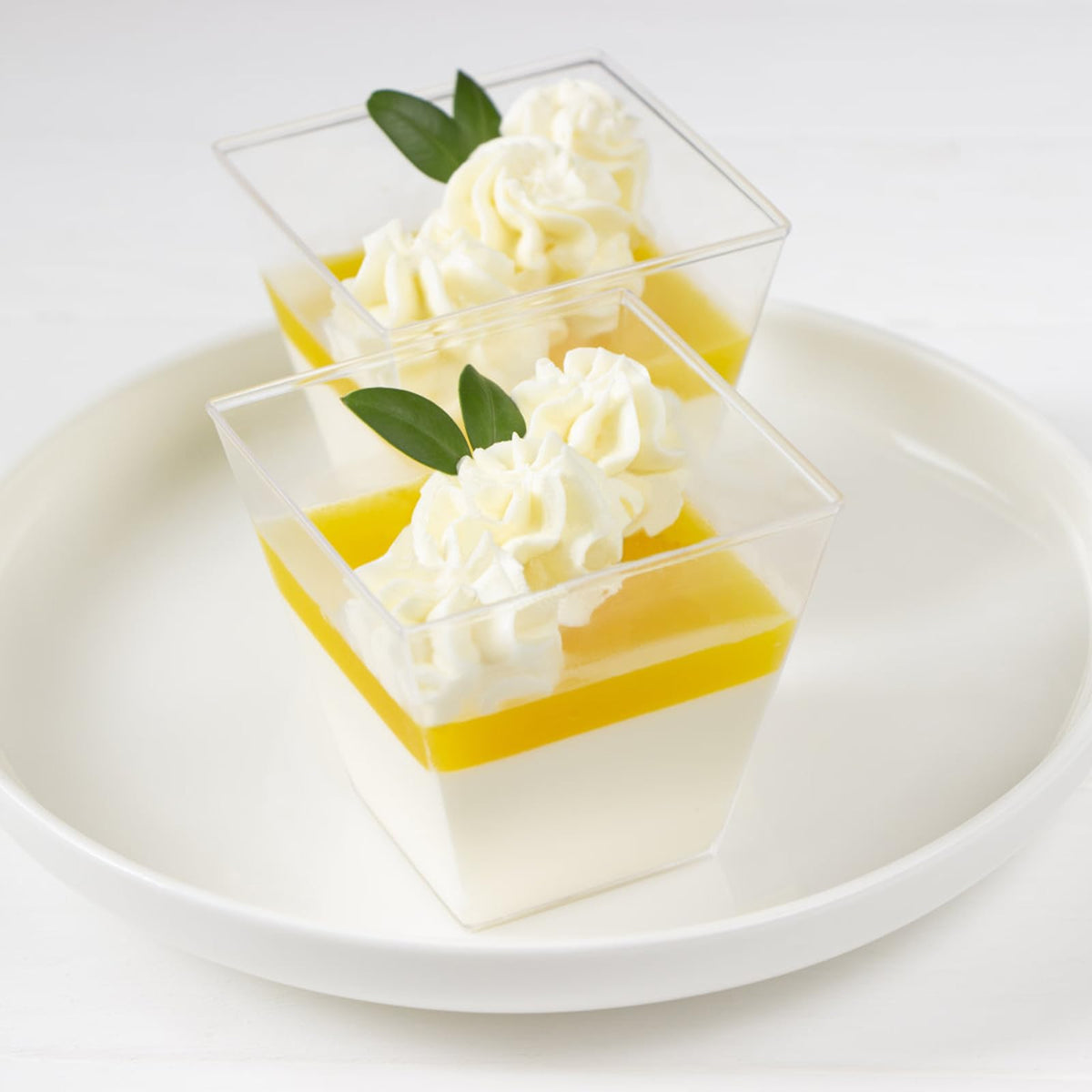 Macepason clear square dessert cups shown for fruit servings, ideal for fresh desserts.